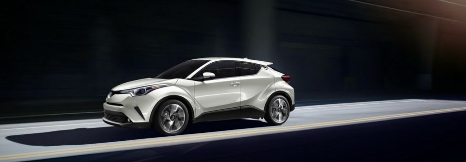 2019 Toyota C-HR driving down the street